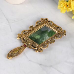 suma vintage hand mirror